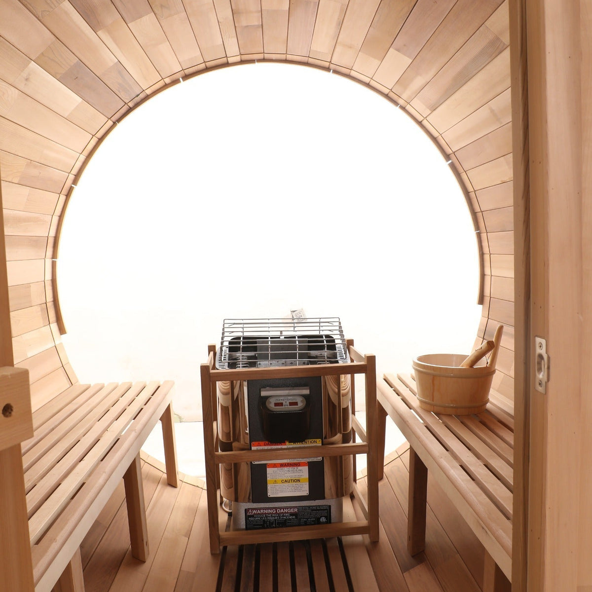 Interior of the Blisspod Prague sauna with wooden benches and heater